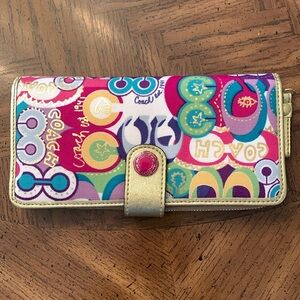 Colorful COACH wallet. Excellent condition. Care instructions inside.